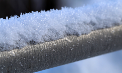 pipe with snow on it.